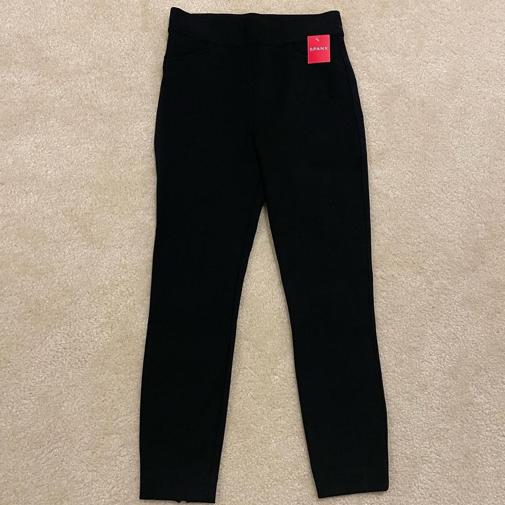 Spanx black leggings. New with tags. Size M.